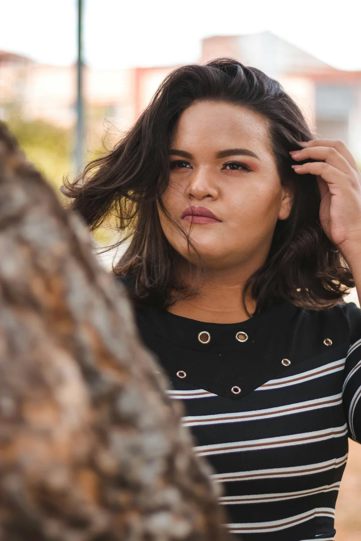 coupe de cheveux pour affiner visage d'une femme en surpoids